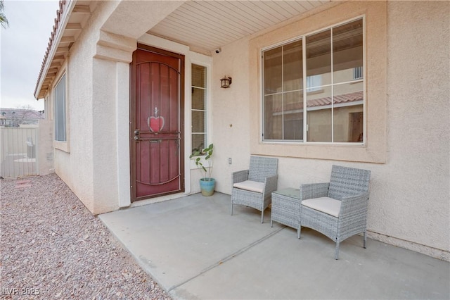 10605 Moon Flower Arbor Pl, Las Vegas, NV 89144 - view of exterior entry with stucco siding