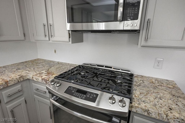 2316 Pine Bluff Ct, Las Vegas, NV 89134 - kitchen with stainless steel appliances