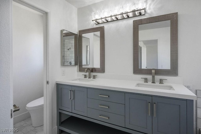 2316 Pine Bluff Ct, Las Vegas, NV 89134 - full bath featuring toilet, marble look tiles, and double vanity