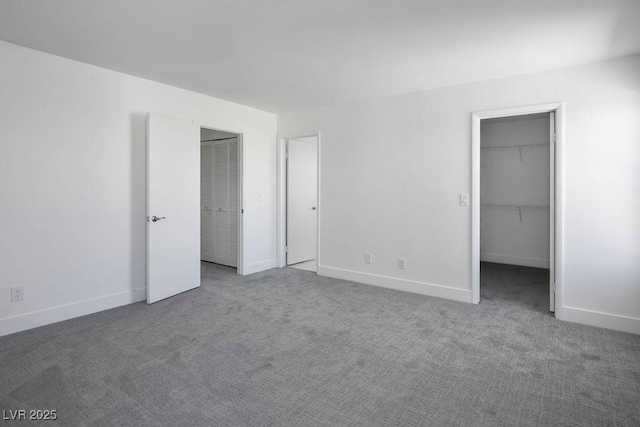 2316 Pine Bluff Ct, Las Vegas, NV 89134 - unfurnished bedroom featuring carpet, baseboards, and a spacious closet