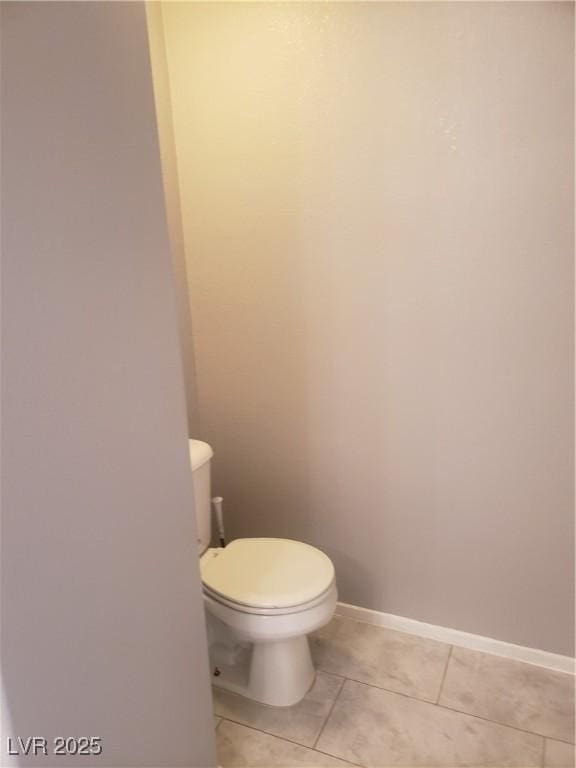 5655 E Sahara Ave Unit 2068, Las Vegas, NV 89142 - bathroom featuring toilet, tile patterned floors, and baseboards