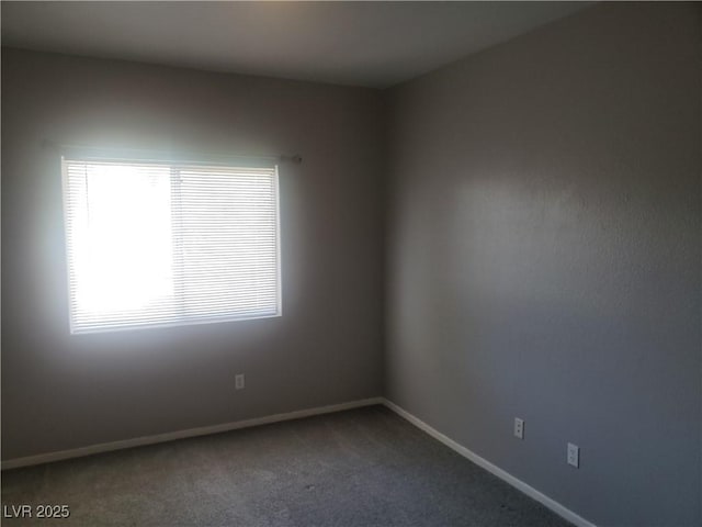 5655 E Sahara Ave Unit 2068, Las Vegas, NV 89142 - carpeted spare room featuring plenty of natural light and baseboards