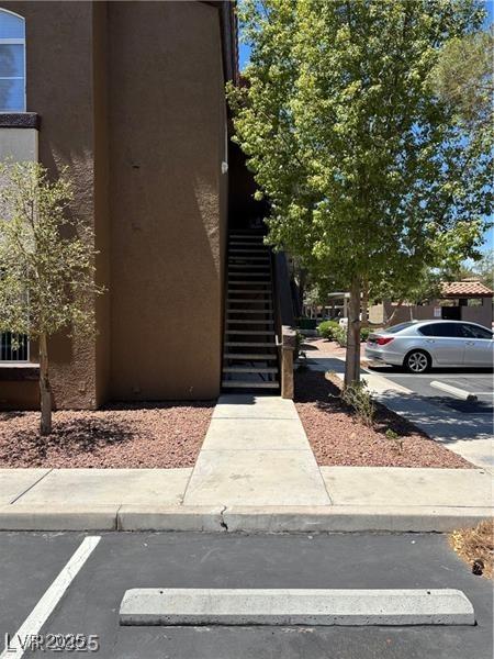 9000 Las Vegas Blvd Unit 2189, Las Vegas, NV 89123 - doorway to property featuring stucco siding and uncovered parking