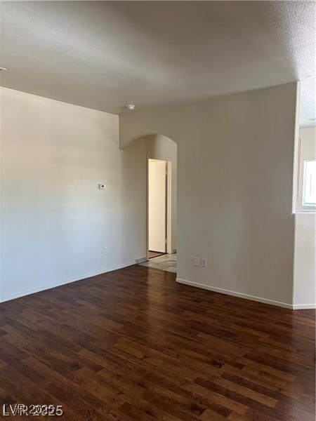 9000 Las Vegas Blvd Unit 2189, Las Vegas, NV 89123 - empty room with arched walkways, dark wood finished floors, and baseboards