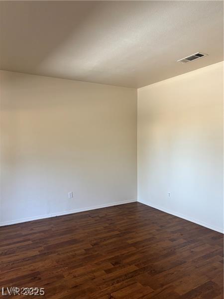 9000 Las Vegas Blvd Unit 2189, Las Vegas, NV 89123 - empty room with dark wood-style floors and baseboards