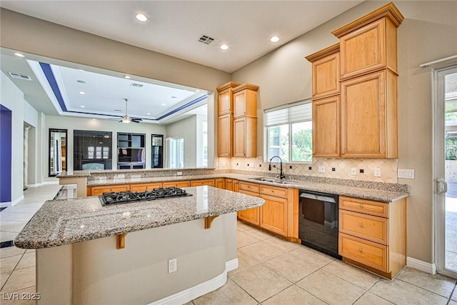 213 Villa Borghese St, Las Vegas, NV 89138 - kitchen with black dishwasher, a sink, light tile patterned floors, a peninsula, and recessed lighting