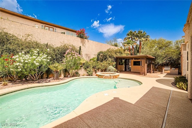 213 Villa Borghese St, Las Vegas, NV 89138 - view of pool featuring a patio area, a fenced backyard, and a pool with connected hot tub