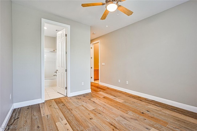 213 Villa Borghese St, Las Vegas, NV 89138 - unfurnished bedroom with light wood-style flooring, baseboards, connected bathroom, and ceiling fan