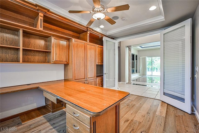 213 Villa Borghese St, Las Vegas, NV 89138 - unfurnished office with ornamental molding, built in desk, light wood-type flooring, baseboards, and recessed lighting