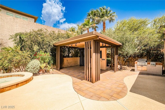 213 Villa Borghese St, Las Vegas, NV 89138 - view of patio / terrace with a gazebo and an in-ground hot tub