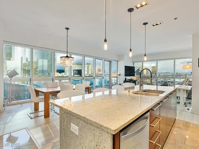 4471 Dean Martin Dr Unit 1109, Las Vegas, NV 89103 - kitchen with a sink, dishwasher, a center island with sink, and plenty of natural light