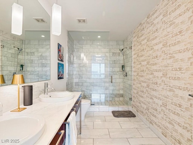 4471 Dean Martin Dr Unit 1109, Las Vegas, NV 89103 - bathroom with a shower stall, double vanity, toilet, and marble look tile flooring