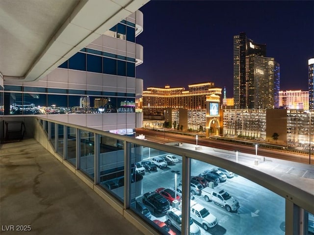 4471 Dean Martin Dr Unit 1109, Las Vegas, NV 89103 - balcony at twilight with a view of city lights