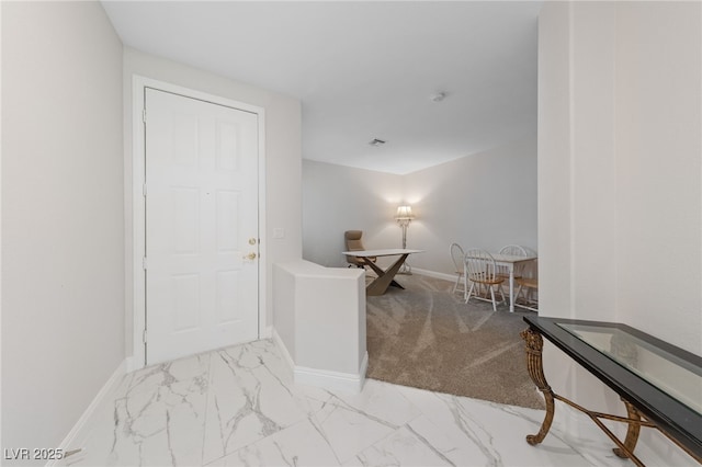 1912 Summer Pine Ct Unit 102, Las Vegas, NV 89134 - entryway with marble look tiles and baseboards