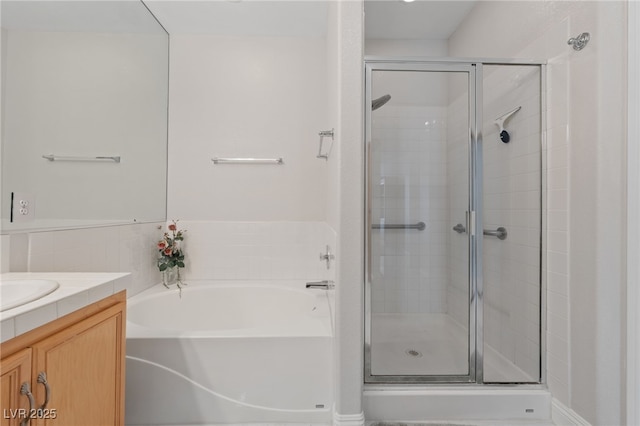 1912 Summer Pine Ct Unit 102, Las Vegas, NV 89134 - full bathroom with a stall shower, a bath, and vanity