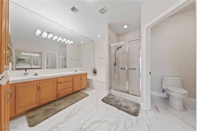 1912 Summer Pine Ct Unit 102, Las Vegas, NV 89134 - bathroom featuring a garden tub, double vanity, a stall shower, toilet, and marble finish floors