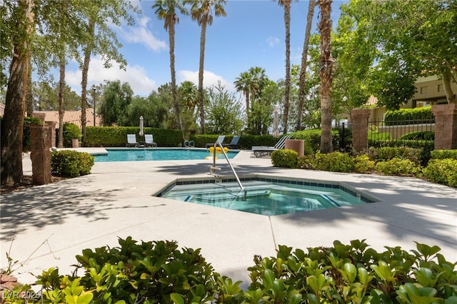 1912 Summer Pine Ct Unit 102, Las Vegas, NV 89134 - community pool with a community hot tub and a patio