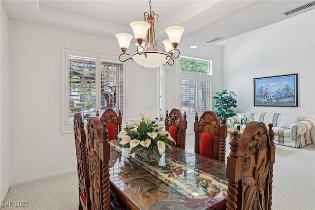 8224 Fowler Falls Ct, North Las Vegas, NV 89085 - carpeted dining area with a chandelier and baseboards