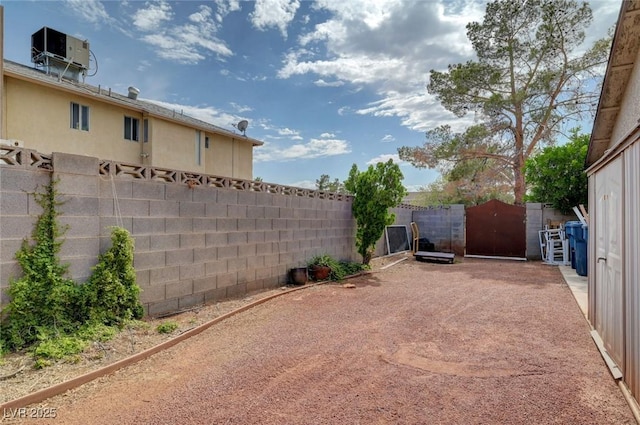 872 N Linn Ln, Las Vegas, NV 89110 - fenced backyard featuring central AC unit