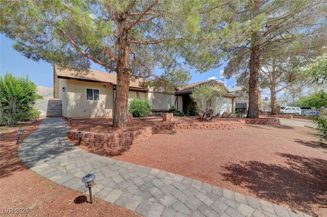 872 N Linn Ln, Las Vegas, NV 89110 - view of front of home featuring a garage and stucco siding
