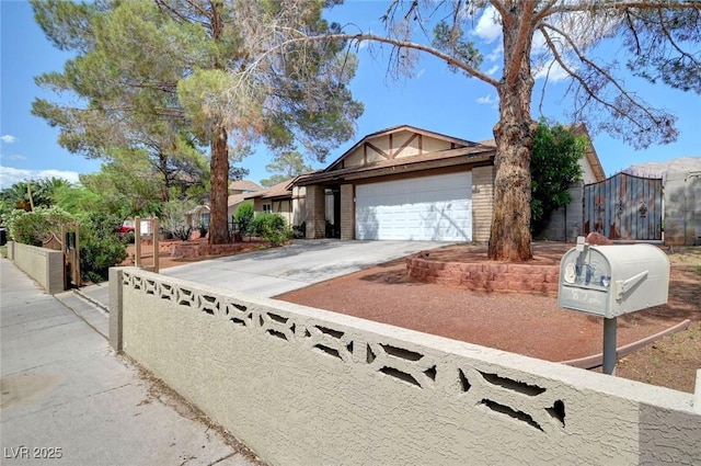 872 N Linn Ln, Las Vegas, NV 89110 - view of front facade featuring a garage and driveway