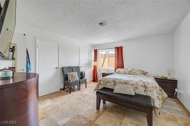 872 N Linn Ln, Las Vegas, NV 89110 - bedroom featuring a textured ceiling
