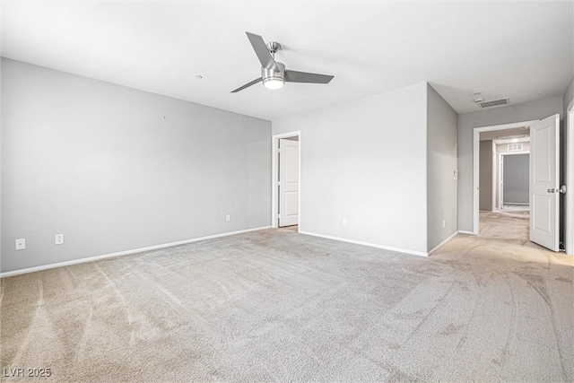 3188 Via Da Vinci, Henderson, NV 89044 - empty room with ceiling fan, light carpet, and baseboards