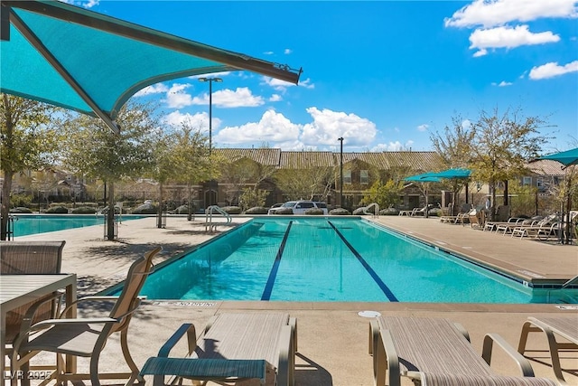 3188 Via Da Vinci, Henderson, NV 89044 - community pool with a patio
