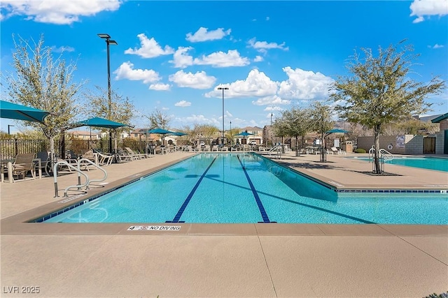3188 Via Da Vinci, Henderson, NV 89044 - community pool with a patio