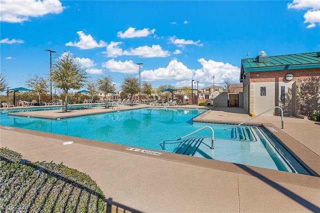 3188 Via Da Vinci, Henderson, NV 89044 - community pool featuring a patio area