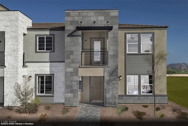 871 Apatite Pl Lot 54, Henderson, NV 89011 - contemporary house with a balcony and stone siding