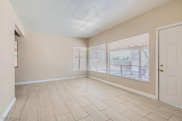 1404 Atlantic St, Las Vegas, NV 89104 - spare room featuring baseboards