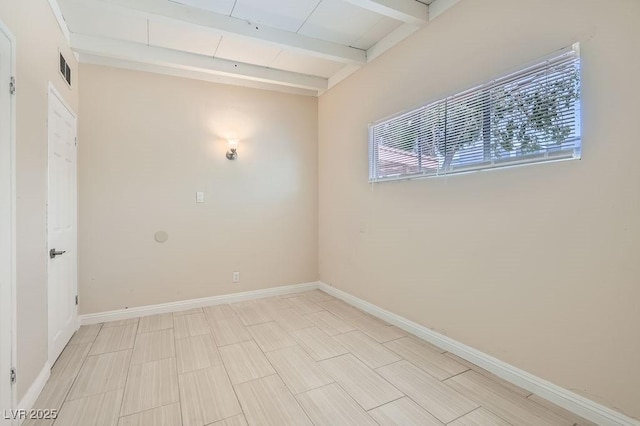 1404 Atlantic St, Las Vegas, NV 89104 - empty room with beam ceiling and baseboards