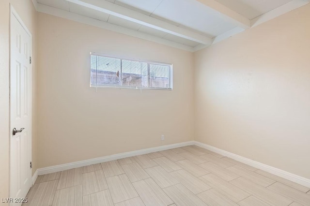 1404 Atlantic St, Las Vegas, NV 89104 - empty room with beamed ceiling and baseboards
