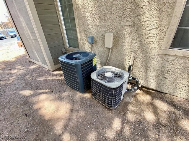 4682 Leeann Ln, Las Vegas, NV 89121 - exterior view of cooling unit and stucco siding