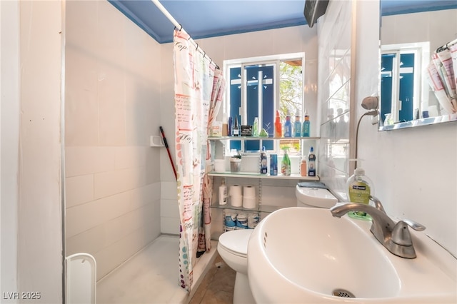 300 N 14th St, Las Vegas, NV 89101 - full bath with a sink, a stall shower, and toilet