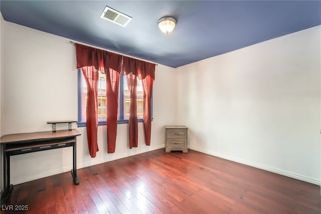 300 N 14th St, Las Vegas, NV 89101 - unfurnished room with wood finished floors and baseboards