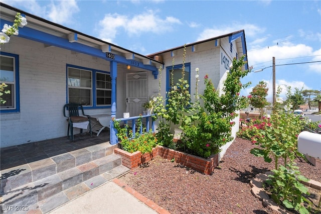 300 N 14th St, Las Vegas, NV 89101 - property entrance featuring brick siding and covered porch