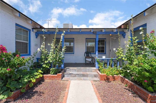 300 N 14th St, Las Vegas, NV 89101 - entrance to property featuring covered porch and central air condition unit