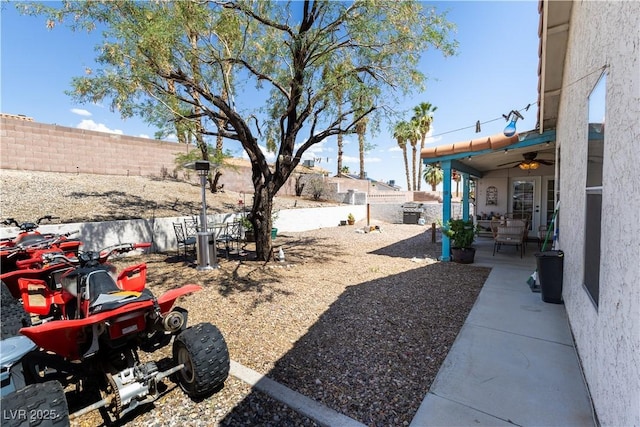 3236 Manzanita Ln, Laughlin, NV 89029 - fenced backyard featuring ceiling fan and a patio area