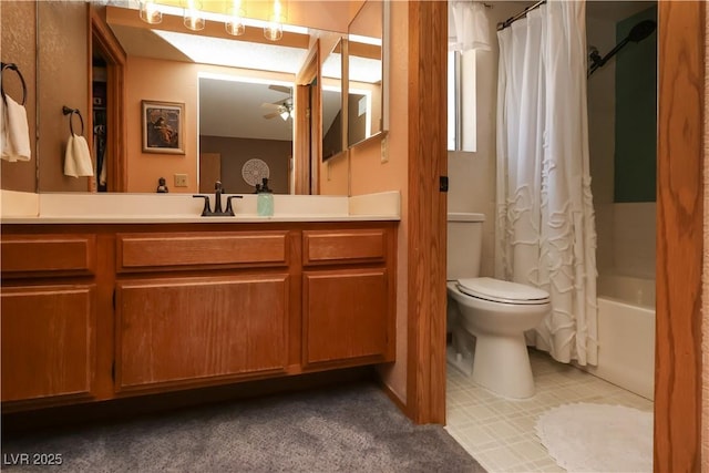 3236 Manzanita Ln, Laughlin, NV 89029 - bathroom featuring toilet, ceiling fan, shower / bathtub combination with curtain, and vanity