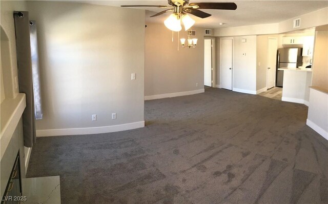 4555 E Sahara Ave Unit 226, Las Vegas, NV 89104 - unfurnished living room with ceiling fan, carpet floors, and baseboards