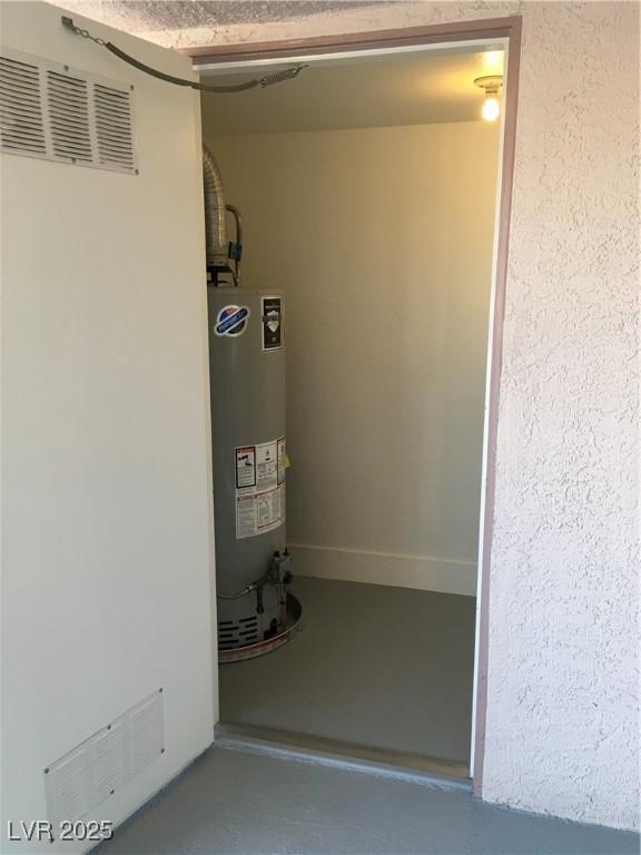 4555 E Sahara Ave Unit 226, Las Vegas, NV 89104 - utility room with gas water heater