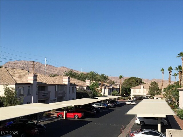 4555 E Sahara Ave Unit 226, Las Vegas, NV 89104 - view of asphalt road featuring a mountain view and a residential view