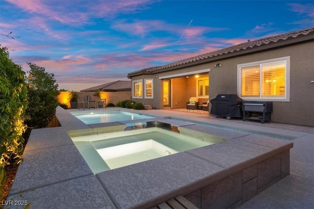 6192 Lautman Ridge Ct, Las Vegas, NV 89141 - view of swimming pool with area for grilling, a patio area, and a pool with connected hot tub