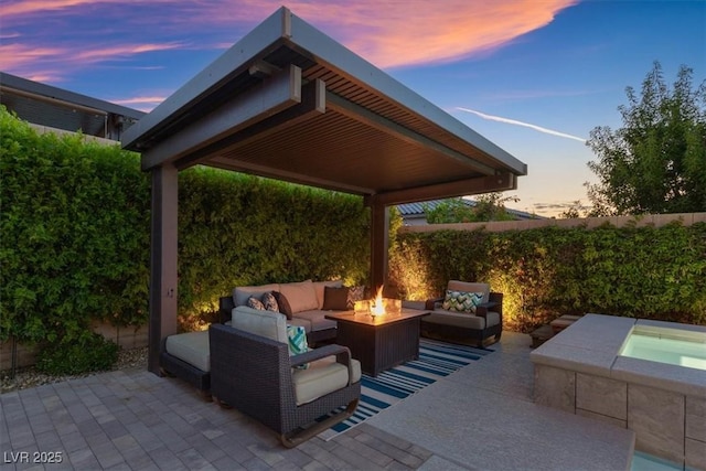 6192 Lautman Ridge Ct, Las Vegas, NV 89141 - fenced backyard with an outdoor living space with a fire pit, a patio, and an in-ground hot tub