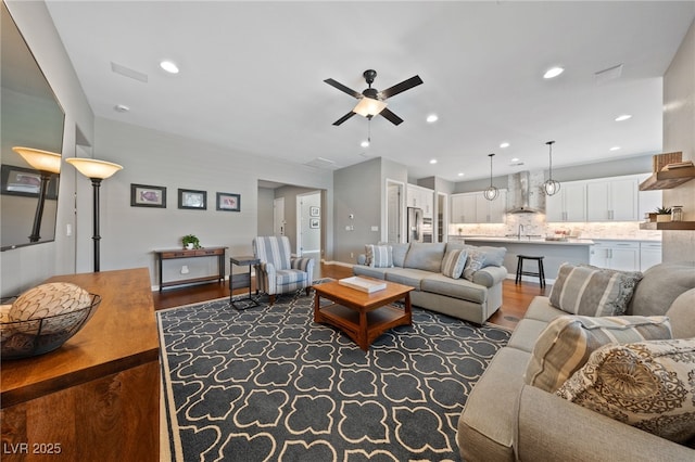 6192 Lautman Ridge Ct, Las Vegas, NV 89141 - living area with wood finished floors, a ceiling fan, and recessed lighting