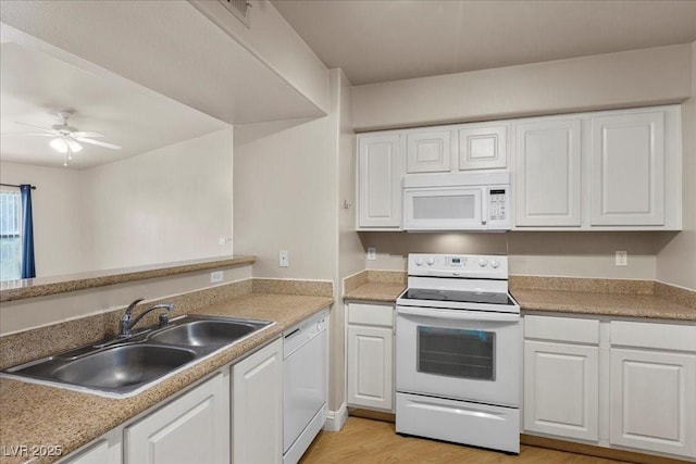 8000 Badura Ave Unit 2028, Las Vegas, NV 89113 - kitchen featuring white appliances, a sink, white cabinets, and a ceiling fan