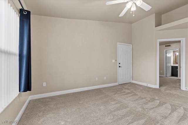 8000 Badura Ave Unit 2028, Las Vegas, NV 89113 - unfurnished room with ceiling fan, light carpet, and baseboards