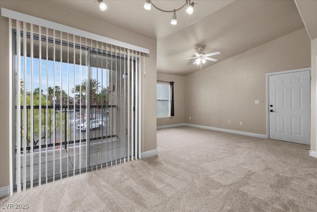 8000 Badura Ave Unit 2028, Las Vegas, NV 89113 - spare room featuring carpet, a ceiling fan, baseboards, and lofted ceiling